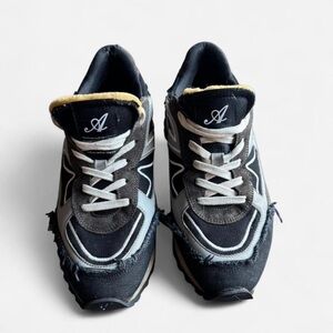 Axel Arigato Black and White Distressed Sneakers